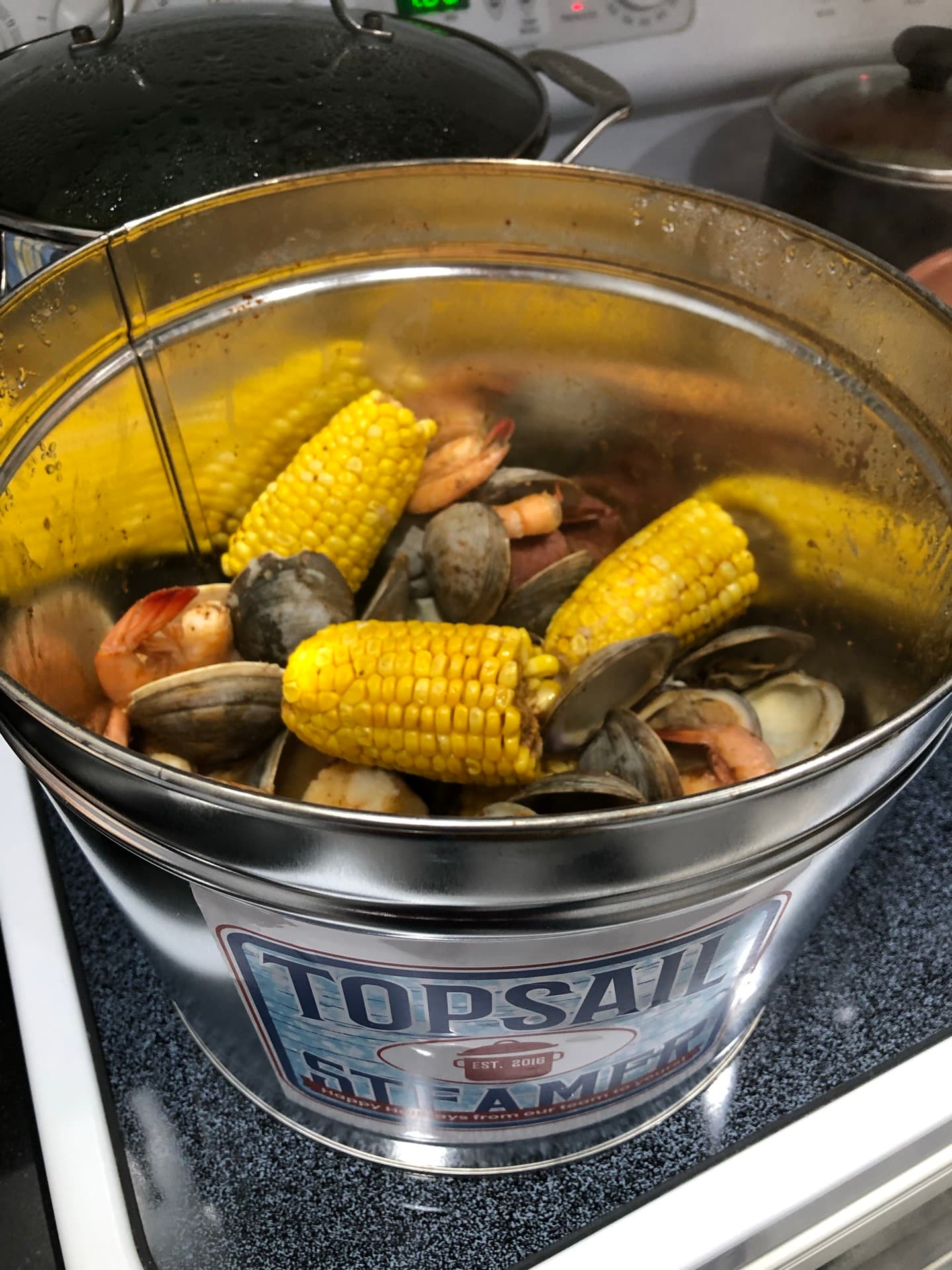 Topsail Steamer steam-pot with crab, clams, and corn